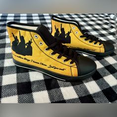 Brand New, Never Worn Broadway-Themed Hamilton Sneakers. Collectible, No Longer Available. Women Shoe Size 7, Men Size 5. Gold Canvas With Back Accents, Laces & Sole. Converse Style (Not Converse Brand). Right Side Of Each Sneaker Features Schuyler Sisters Silhouette, Text: “There Is A Million Things I Haven’t Done. Just You Wait”. Left Side Of Each Sneaker Features Hamilton/Star Logo, Text: “An American Musical” Casual Sneakers For Concert With Round Toe, Casual Sneakers With Round Toe For Concerts, Sisters Silhouette, Hamilton Star, Schuyler Sisters, Gold Canvas, Converse Style, Logo Text, Star Logo