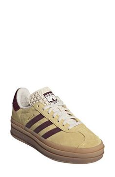 A triple-stacked platform elevates a time-tested sneaker, while serrated side stripes keep it close to its roots. Lace-up style Removable insole Leather upper/synthetic and textile lining/synthetic sole Imported Adidas Gazelle Bold, Gazelle Bold, Platform Sneaker, Adidas Gazelle, Side Stripe, Up Styles, Womens Shoes Sneakers, Womens Sneakers, Leather Upper