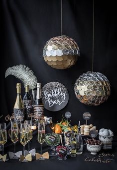 a table topped with lots of bottles and glasses