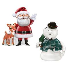 two christmas figurines, one with a santa clause and the other with reindeers