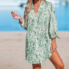 Introducing our Sage Floral Button-Up Cover-Up. The sage hue and delicate floral motifs create an effortlessly chic look, making it the perfect companion for beach days. Product code: CAA07A4A005GP Spring Green Long Sleeve Swimwear, Green Beachy Swimwear For Day Out, Casual Green Beach Swimwear, Green Swimwear For Spring Day Out, Green Tropical Swimwear For Day Out, Casual Long Sleeve Swimwear For Day Out, Summer Beach Swimwear With Button Closure, Casual Green Swimwear For Beach, Tropical Green Swimwear For Day Out