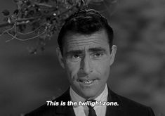 a man in a suit and tie with a quote on it that says, this is the twilight zone