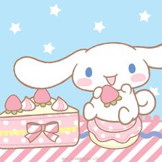 a cartoon bunny holding a piece of cake next to a pink box with strawberries on it