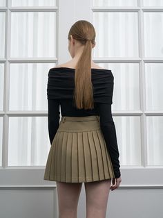 This product, the Rente Pleats Skirt, is a modern take on a timeless design. It features sharp, defined pleats that add volume and movement to the piece. The high-waisted cut and built-in belt detail create a flattering silhouette that can transition from day to night with ease. - The Rente Pleats Skirt's crisp pleats provide a structured yet feminine appeal.- Its high waist and belt detail cinch the silhouette, offering both style and function.- The skirt is designed with a playful flair, making it an excellent piece for both casual and dressy occasions.- The construction includes a concealed zipper for a smooth fit and a polished finish. Fitted Pleated Flared Skirt With Belt Loops, Chic Fitted Pleated Skirt With Belt Loops, Belted Fitted Pleated Skirt, Fitted Belted Pleated Skirt, Fitted Pleated Skirt With Belt Loops For Fall, Fitted High Waist Pleated Skirt With Belt Loops, Chic High Waist Fitted Pleated Skirt, High Waist Fitted Belted Pleated Skirt, Elegant Mini Pleated Skirt With Belt Loops