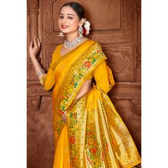 Yellow colored saree is made from paithani banarasi silk fabric which is highlighted with beautiful weaving and tassels border as shown. comes along unstitched paithani banarasi silk blouse piece which you can customise as per your design/style. Occasion - You can wear this saree for festivals, functions and ideal for any fashionista. Note:- the actual product may differ slightly in color and design from the one illustrated in the images when compared with computer or mobile screen. Traditional Paithani Silk Saree For Navratri, Traditional Yellow Saree With Meenakari, Navratri Paithani Silk Saree With Meenakari, Yellow Paithani Silk Saree With Meenakari, Eid Yellow Paithani Silk Saree, Yellow Pre-draped Paithani Silk Saree With Self Design, Navratri Yellow Saree With Meenakari, Traditional Yellow Paithani Silk Pre-draped Saree, Yellow Meenakari Saree For Navratri