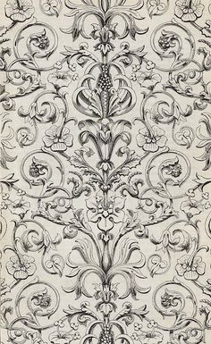 an old fashioned wallpaper pattern with swirls and scrolls on it's edges