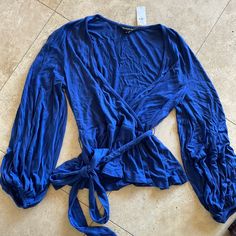 Size Xs New With Tags. Pretty Cobalt Blue Color With Tie Detailing Around The Waist Blue Wrap Tops For Fall, Casual Blue Wrap Top, Spring Blue Wrap Blouse, Blue Fitted Top For Brunch, Fitted Blue Top For Brunch, Black Crochet Lace Top, Tweed Top, Sleeveless Tunic Tops, Women White Blouse