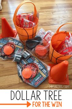 dollar tree for the win with basketballs and candy in orange buckets on wooden floor