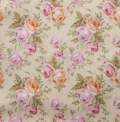 the fabric has pink and orange roses on it