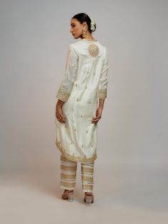 Editor's Note Elevate your style with a fusion of contemporary design and traditional elegance. This kurta, dupatta, and pant set is meticulously crafted with intricate detailing, a flattering pattern, and a perfect blend of modern and ethnic elements. It's a statement ensemble that effortlessly combines grace and modern flair. Rahul Khanna, White Pant, Indian Arts And Crafts, Personal Shopping Service, Nyc Studio, Nehru Jackets, Western Wedding, Wedding Service, Short Suit