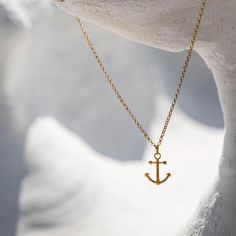 Moor yourself to windswept beaches, sparkling lighthouses and seaside memories. Sunny days blend best with sunset G&T’s, flowy threads and your chic Anchor Charm in 14k gold vermeil. Approximate dimensions: 23.5 mm x 19 mm Gold Nautical Jewelry For The Beach, Gold Nautical Jewelry For Beach, Nautical Style Gold Jewelry For The Beach, Gold Coastal Jewelry Gift, Anchor Charm, Gold Vermeil, Sunny Days, Cross Necklace, Arrow Necklace