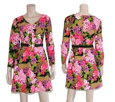 "This 60s era go go dress features a delightful pink floral print, fit-n-flare silhouette, long sleeves, and mini length skirt. Just needs some go go boots to complete the look! Dress is unlined and zips up back. Best fits size small or medium (please check measurements below). Belt not included. Approximate Flat Measurements: Multiply times 2 for bust, waist, and hip measurements. For best fit, compare with a similar style of clothing which you already own. Total Length: 33.75\" Shoulder to Sho Retro Long Sleeve Mini Dress With Floral Print, 1970s Style Mini Dress For Spring, 1970s Style Long Sleeve Dresses For Spring, 1970s Long Sleeve Dresses For Spring, Retro Fitted Floral Dress For Spring, 1970s Style Long Sleeve Dresses For Garden Party, Vintage Long Sleeve Floral Dress For Garden Party, 1970s Pink Long Sleeve Dress, Go Go Dress