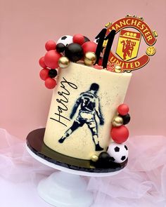 a birthday cake decorated with an image of a soccer player