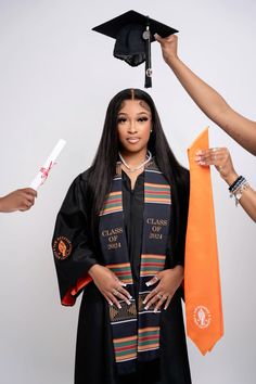 a woman wearing a graduation cap and gown