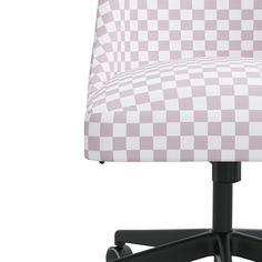 a pink and white checkerboard office chair with black casteors on an isolated white background