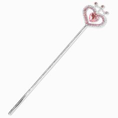 a pink crystal heart shaped wand with crystals on it