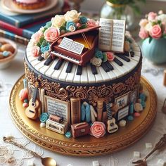 a cake decorated with musical instruments and flowers