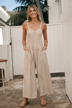 Turn heads in the Striped Sleeveless V-Neck Wide Leg Jumpsuit! With its striking stripes and flattering V-neck, this jumpsuit is all about easy elegance and standout style. Product code: CAA13E4G014GJ Features:  Woven V-neckline Sleeveless Wide leg Pattern: Stripes Wash Method: Regular Wash Material: 55%COTTON,45%POLYESTER. Resort Wear For Women, Affordable Swimwear, Make Memories, Striped Jumpsuit, Casual Jumpsuit, Casual Stripes, Mom Outfits, Wide Leg Jumpsuit, Body Shape