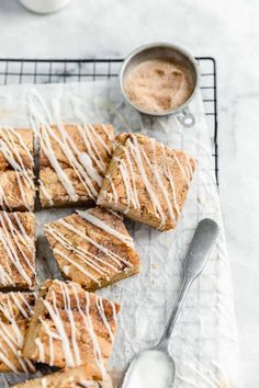 cinnamon sugar bars with icing on a cooling rack