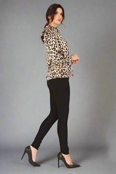 This leopard print blouse exudes luxury and sophistication. The soft, silky material provides a comfortable and stylish fit, making it a versatile addition to any wardrobe. With its eye-catching print this top is perfect for any occasion. Regular fit Long sleeves Material polyester Machine wash cold Model is 5'9" and wears US small S: 17.5" (Bust), 13.5" (Shoulder), 25.75" (Length), 21" (Sleeve Length) M: 18.5" (Bust), 14" (Shoulder), 26.25" (Length), 24.5" (Sleeve Length) L: 19.5" (Bust), 14.5" Chic Leopard Print Tops For Night Out, Chic Leopard Print Blouse For Fall, Chic Leopard Print Tops For Work, Casual Stretch Leopard Print Blouse, Fall Tiger Print Tops, Chic Fall Tiger Print Tops, Leopard Print Stretch Blouse For Spring, Spring Leopard Print Stretch Blouse, Fall Leopard Print Stretch Blouse