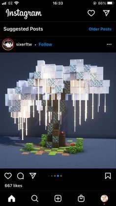 an image of a tree that is made out of paper and some kind of lights