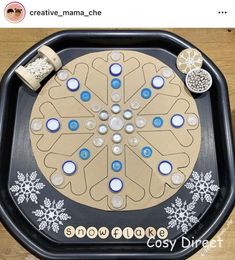 a board game with buttons and snowflakes on it