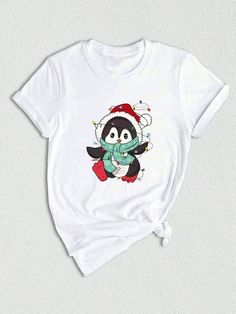 Get ready to celebrate the holiday season in style with our Penguin Christmas Shirt! This adorable shirt features a cute penguin design that will instantly put you in a festive mood. Whether you're attending a Christmas party or just spreading some holiday cheer, this shirt is a must-have addition to your wardrobe. So why wait? Grab your Penguin Christmas Shirt today and get ready to sleigh the holiday fashion game!Penguin Christmas Shirt, Funny Penguin Shirt, Penguin Lover Shirt, Cute Penguin Shirt, Penguin Clothes, Penguin Lover Gift White Casual  Short Sleeve  Animal,Cartoon,Christmas,Colorblock,Figure,Geometric,Graphic,Letter,Striped,Plants,Textured Pattern    Women Clothing, size features are:Bust: ,Length: ,Sleeve Length: Penguin Clothes, Penguin Shirt, Funny Penguin, Penguin Design, Penguins Funny, Christmas Shirt Funny, Penguin Christmas, Long Sleeve Denim Jacket, Christmas T Shirts