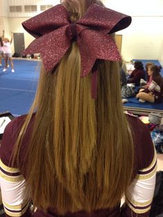 Perfect cheer hair for non-humid football games! Straight halfway pulled back with bow. Cheer Bows Hairstyles, Cute Cheerleading Hairstyles, Cute Cheer Hairstyles, Low Ponytail Hairstyles, Competition Hair, Cheerleading Hairstyles, Ribbon Hairstyle, Makeup Hacks Beauty Secrets