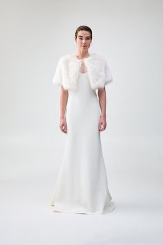 Dress the party: receive 20% off when purchasing four or more bridal styles. Use code BRIDAL20 at checkout. Our Love A Fur Bolero layers beautifully over the shoulders and provides a luxe touch of cozy glamour for the party after the ceremony. The Love A Fur Bolero features short sleeves, a high cropped silhouette, and an open front. This garment is a one-size accessory. Fur Bolero, Bridal Styles, Love And Respect, Love A, Bridal Style, Our Love