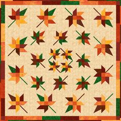 a quilt with leaves on it is shown in orange, green and yellow colors that appear to be autumn