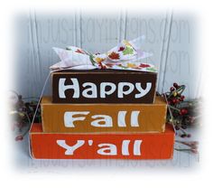 a stack of fall boxes with the words happy fall y'all written on them