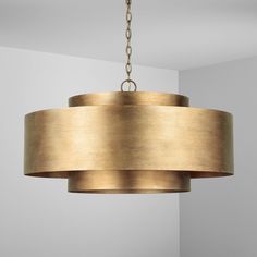 a light fixture hanging from a ceiling in a room