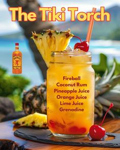 the tiki torch cocktail is served with pineapple juice and cherries