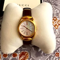 Gucci Women’s Watch.”Horsebit Quartz” Brown Leather Strap With Gold Rim Around The Face. Excellent Condition, Never Worn, Received As A Gift. Very Light Weight. Price Tag Still Attached Gucci Yellow Gold Watch With Diamond Hour Markers, Modern Gucci Yellow Gold Watch, Designer Gucci Yellow Gold Watch, Gucci Timeless Yellow Gold Watch, Gucci Yellow Gold Formal Watch, Gucci Yellow Gold Watch For Formal Occasions, Gucci Gold Jewelry With Diamond Hour Markers, Yellow Gold Gucci Watch For Formal Occasions, Gucci Timeless Round Watch