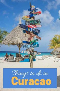 a sign post with the words things to do in curacao written on it