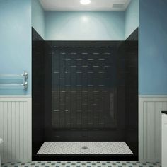 a black and white bathroom with blue walls