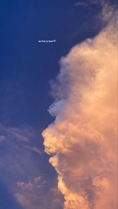 an airplane is flying in the sky at sunset