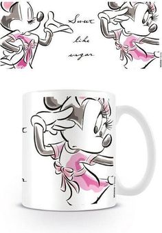 a coffee mug with minnie mouse designs on it