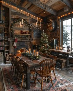 a rustic dining room decorated for christmas with lights on the fireplace and wooden table surrounded by chairs