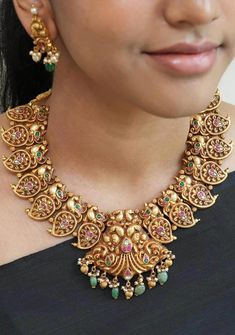 Handcrafted with pure 92.5 sliver and gold plated in 24 kt gold, this necklace set in a contemporized version of the Mango necklace is a fusion of deep nagas and Kundan work. It takes about 100 days to make this one of a kind masterpiece for a one of a kind woman! Height-155 mm width-170 mm Note: Please note that there are no returns, exchanges or cancellations on precious pearls and other jewelry items. Note Product Care: Proper care is essential to maintain the elegance of your silver jewelry. Mango Gold Necklace, Mango Mala Designs, Mala Designs, Mango Mala, Mango Necklace, Gold Jewels Design, Pure Gold Jewellery, Kundan Work, Antique Jewelry Indian