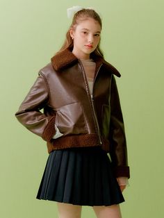 Editor's Notes The shearling jacket is made of fur and faux leather and has a wide collar. - Square pockets on both sides- Silver metal zipper for opening & closing- Short length - Loose silhouette- Casual moodMeasurements(in.)S / M- Chest: 42.91 in / 44.88 in. - Sleeve Length: 21.25 in / 21.65 in. - Sleeve Opening: 12.99 in / 13.38 in. - Sleeve Width: 14.56 in / 14.96 in. - Shoulder: 20.47 in / 20.86 in. - Length: 21.25 in. / 21.65 in. Model Brown Fur Coat With Padded Collar For Fall, Brown Fur Coat With Zipper For Fall, Winter Tops, Shearling Jacket, Metal Zipper, Short Jacket, Faux Fur Coat, Stylish Outfits, Faux Leather