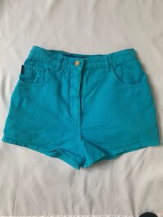 Glorious 1980s teal denim hot pants shorts by 'outpost'.  Marked size 10, waist approx 26", 12" waistband to hem.  In very good vintage condition. Fitted High Waist Cotton Jean Shorts, Fitted High-waist Cotton Jean Shorts, Retro High Waist Fitted Jean Shorts, Retro Fitted Denim Shorts, Fitted Retro Denim Shorts, Retro High-waist Fitted Jean Shorts, Fitted Green Jean Shorts With Pockets, Retro High Waist Jean Shorts For Summer, Retro High-waist Jean Shorts For Summer