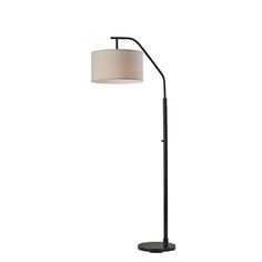 a black floor lamp with a white shade on the base and a round light fixture