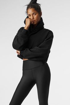 A cute and comfy counterpart to your high-waisted favorites, the Bae Hoodie has a relaxed fit, long scrunchable sleeves, ribbed cuffs and a slightly cropped ribbed hem that highlights the natural waist. The pocketless design is streamlined and bulk-free, and the French terry is an absolute pleasure to pull on: smooth on outside and fleecy on the inside. Stretch Ribbed Hooded Top, Cozy Stretch Solid Hoodie, Casual Stretch Ribbed Hoodie, Ribbed Hooded Hoodie For Loungewear, Ribbed Hoodie For Loungewear, Sporty Winter Sweatshirt With Ribbed Detail, Cozy Alo Yoga Sweatshirt With Ribbed Cuffs, Sporty Ribbed Sweatshirt For Winter, Sporty Ribbed Winter Sweatshirt