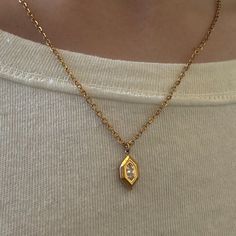 The Sofia Necklace ✨ Featuring a 18k gold plated (Stainless Steel) Oval Link Chain & faux Diamond vintage-inspired pendant 🤍 17.5" in length 😊comes with extender for adjustability.  Hypoallergenic, tarnish resistant, and handmade with love 🫶 Elegant Gold Oval Link Charm Necklace, Elegant Oval Link Charm Necklace For Gifts, Oval Pendant Necklace Chain As Gift, Oval Pendant Necklace With Chain For Gift, Gold Oval Pendant Chain Necklace, Tarnish Resistant, Gold Chain Necklace With Tarnish Resistant Oval Pendant, Gold Chain Necklace With Oval Pendant, Tarnish Resistant, Gold Oval Charm Necklace With Adjustable Chain, Gold Oval Pendant Charm Necklace For Anniversary