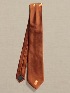 Spun luxury, this incredibly dapper tie is crafted from silk twill for a sophisticated feel on a unique silhouette.  Hand-pressed and shaped for a clean finish.  Measures 3" at widest point.  Length: 58" (147cm) Dapper Semi-formal Neckwear With Ties, Luxury Ties For Semi-formal Occasions, Luxury Semi-formal Neckwear With Ties, Solid Dapper Ties For Formal Occasions, Dapper Neckwear With Ties For Business, Dapper Standard Tie For Business, Timeless Suit And Tie Accessories For Business, Timeless Business Suit And Standard Tie Accessories, Dapper Business Ties