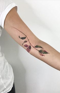 a person with a tattoo on their arm