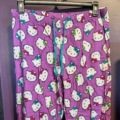 New Without Tags, Unworn In Size Large. 100% Cotton (Light And Airy) With Drawstring. Multicolor Stretch Cotton Sleepwear, Stretch Multicolor Cotton Sleepwear, Multicolor Elastic Waistband Sleepwear For Lounging, Hello Kitty Print Long Pants Sleepwear For Loungewear, Purple Cotton Sleepwear For Pajama Party, Stretch Multicolor Sleepwear For Sleepover, Casual Purple Sleep Pants, Casual Purple Sleepwear For Sleepover, Hello Kitty Print Cotton Sleepwear