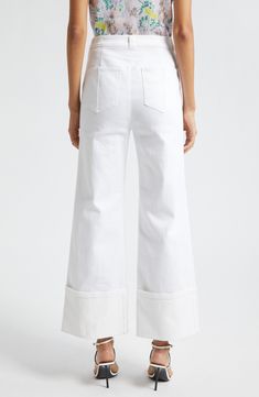 Hit refresh for white-jeans season with this wide-legged pair cut to a very cuffable length for extra trend-right style points. 28 1/2" inseam; 20 1/2" leg opening; 11" front rise; 15 1/2" back rise (size 8) Exposed-button fly Front patch pockets; back patch pockets 75% cotton, 25% polyester, 1% elastane Dry clean or machine wash, tumble dry Imported Relaxed Fit White Flare Jeans With Five Pockets, White Cropped Flare Jeans For Summer, White Cotton Cropped Flare Jeans, White Relaxed Fit Cropped Flare Jeans, White Cropped Leg Flare Jeans, White Relaxed Fit Flare Jeans For Spring, White Cropped Leg Flare Jeans For Fall, White Cropped Flare Jeans For Fall, Modern White Cropped Leg Bottoms