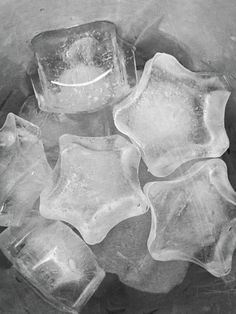 ice cubes are sitting on top of each other